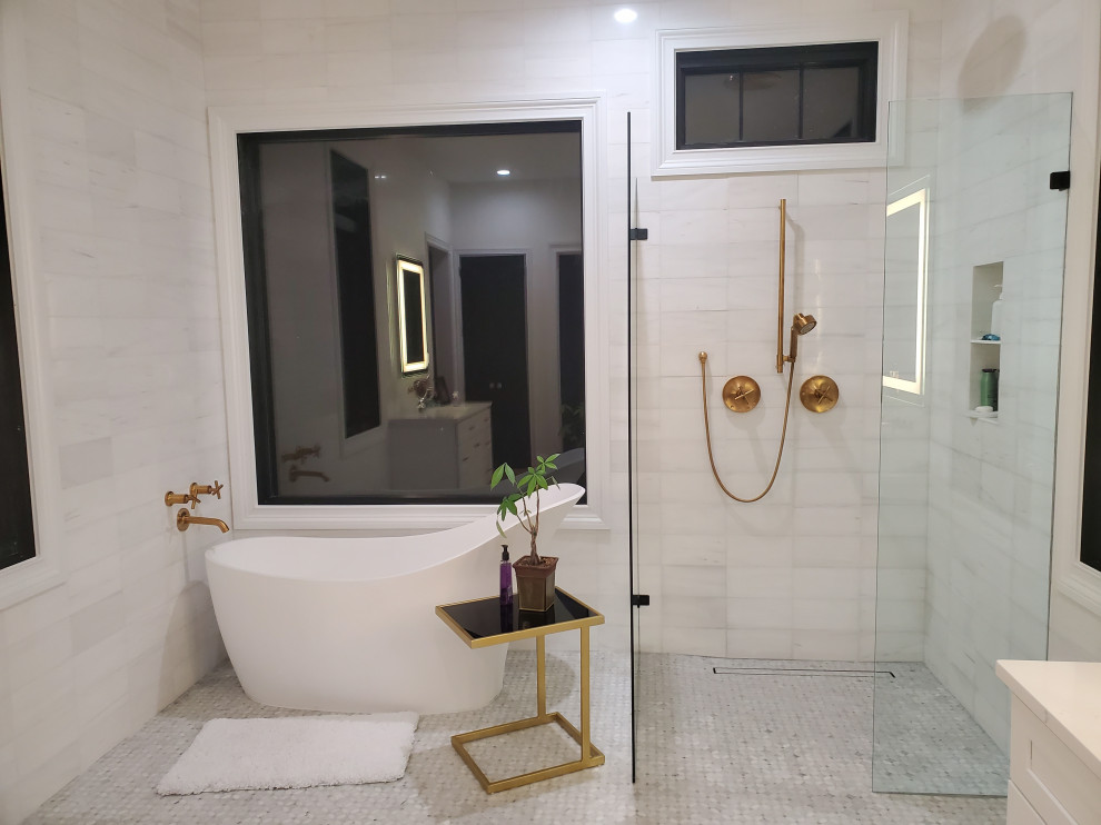 Inspiration for a mid-sized modern master bathroom in Other with a freestanding tub, mosaic tile floors, an open shower, a corner shower, gray tile, marble, orange walls and white floor.