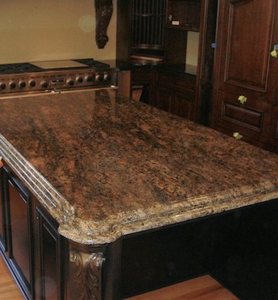 Mid-sized l-shaped enclosed kitchen photo in Phoenix with an island