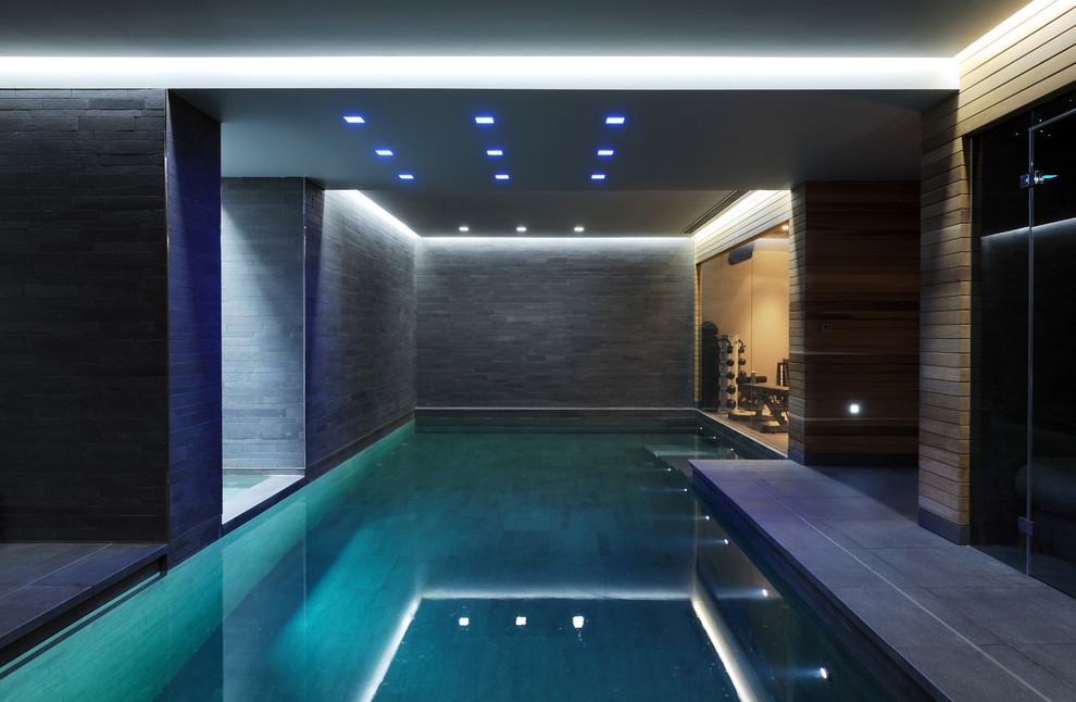 Photo of a large contemporary pool in London.