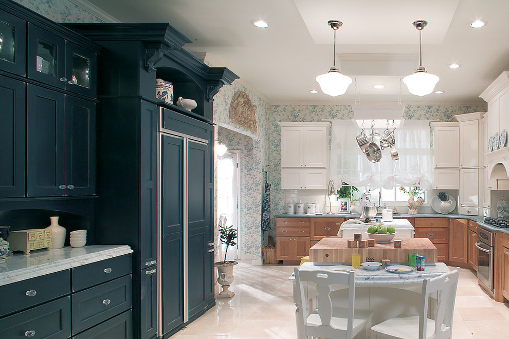 Inspiration for a large transitional l-shaped ceramic tile eat-in kitchen remodel in Denver with an integrated sink, shaker cabinets, green cabinets, quartz countertops, yellow backsplash, ceramic backsplash, colored appliances, blue walls and an island