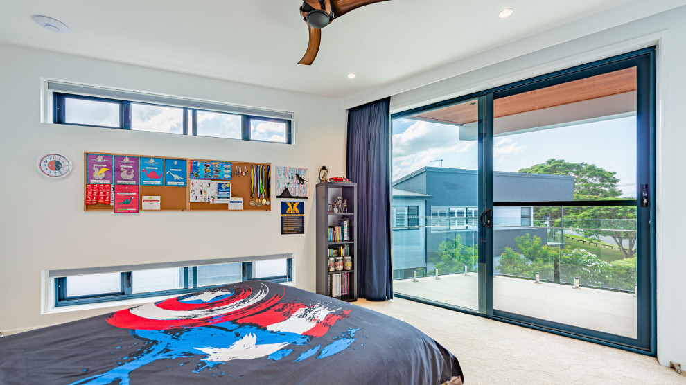 Photo of a modern bedroom in Brisbane.