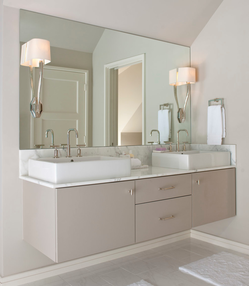 Photo of a transitional bathroom in Dallas with a vessel sink, flat-panel cabinets, grey cabinets and grey walls.