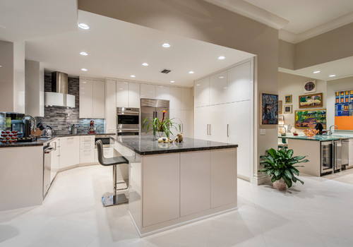 Modern kitchen with high-gloss white kitchen cabinet units, demonstrating a high-value, ergonomic upgrade
