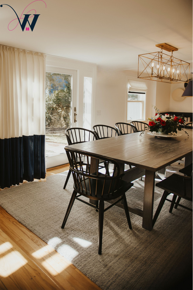 Beach style dining room in Providence with white walls, light hardwood floors and yellow floor.