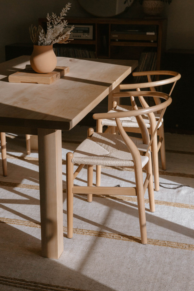 Example of a mid-sized minimalist eat-in kitchen design in San Diego