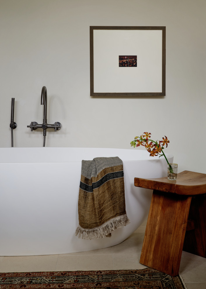 Freestanding bathtub - mid-sized modern master ceramic tile, gray floor and single-sink freestanding bathtub idea in Austin with flat-panel cabinets, white walls, an undermount sink, granite countertops, a hinged shower door, gray countertops and a floating vanity