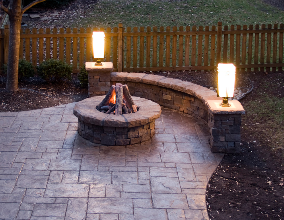 Stamped Concrete Patio Gas Fire Pit Stone Walls And Lighting