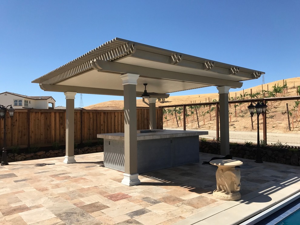 Inspiration for a large traditional backyard patio in San Francisco with an outdoor kitchen, concrete slab and a pergola.