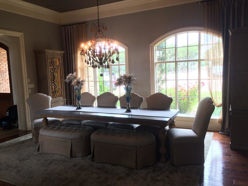 Dining room - mid-sized transitional open concept dark wood floor dining room idea in Austin with beige walls, a standard fireplace, a stone fireplace and no tv