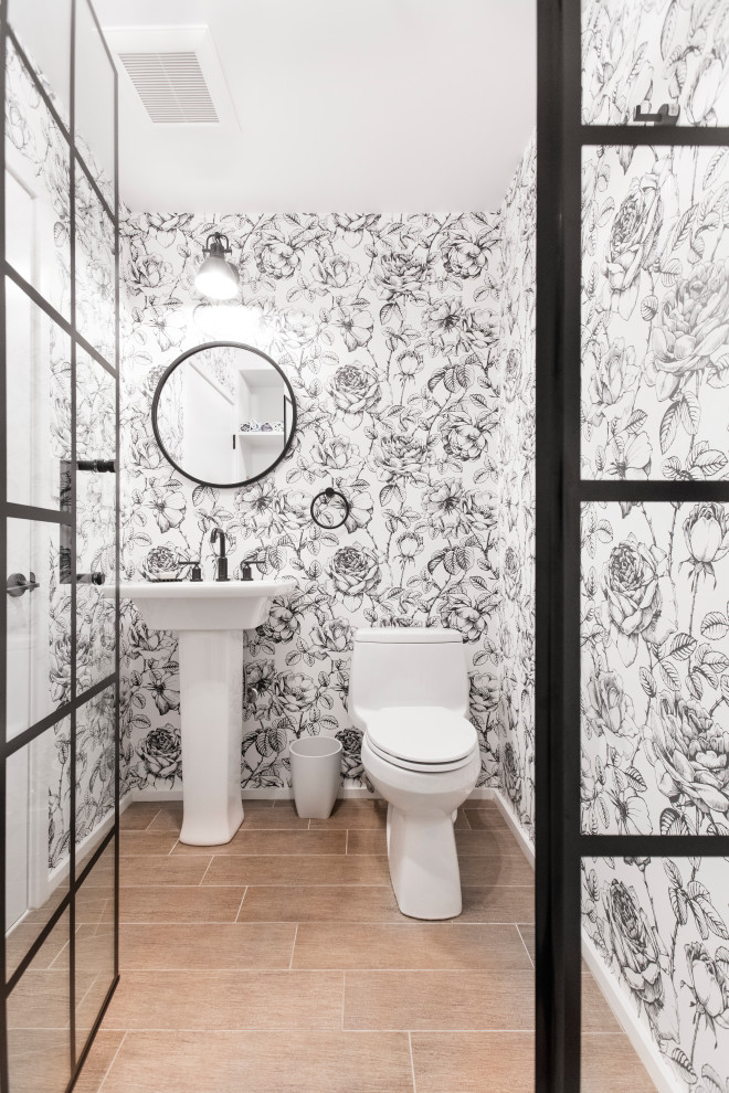 Inspiration for a transitional powder room in New York.