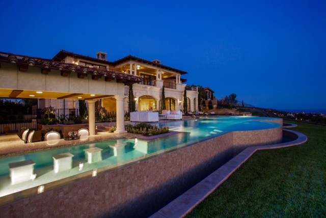 Inspiration for a mediterranean pool remodel in Orange County