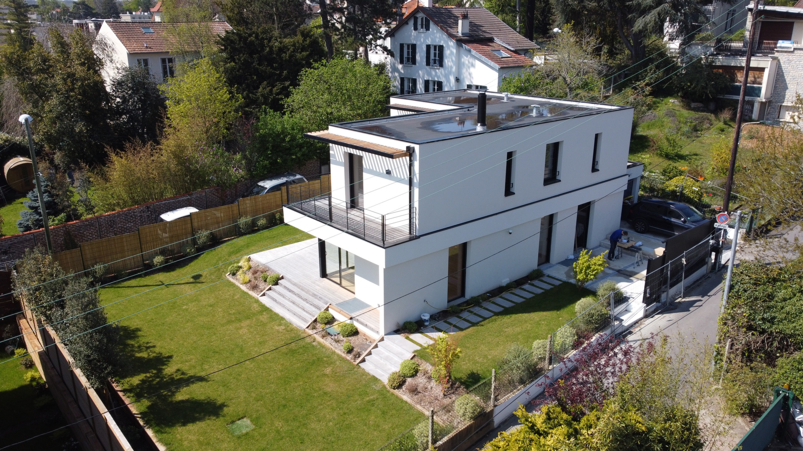 L  - Construction d'une maison - Calme dans la ville