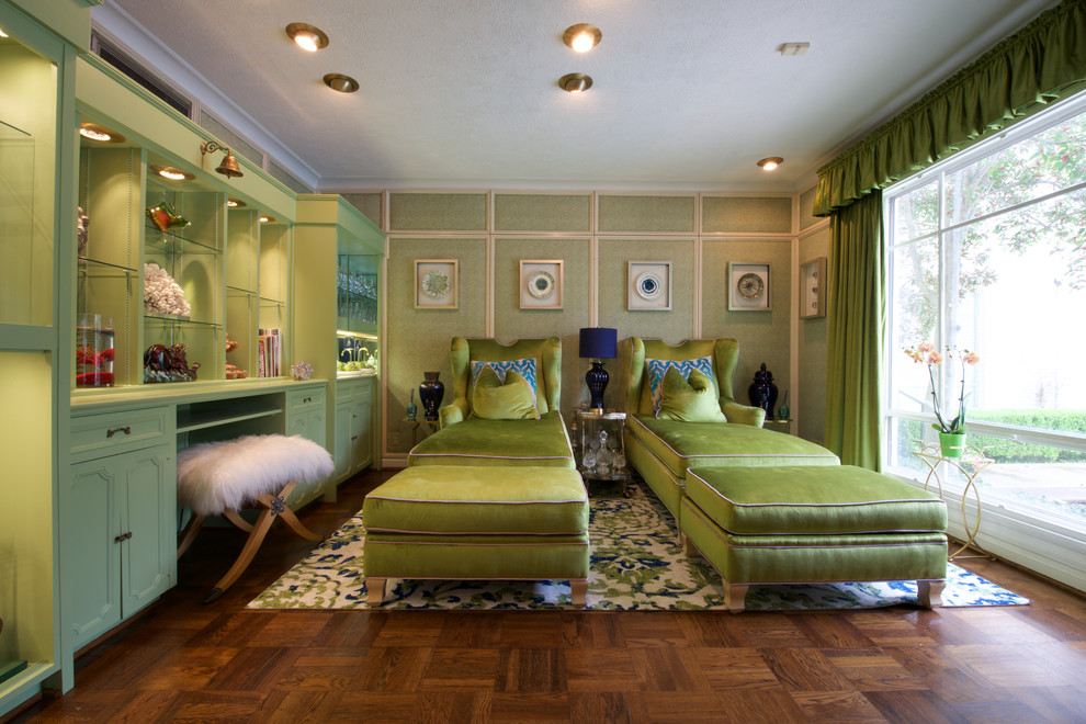 Inspiration for a transitional family room in Dallas with green walls, medium hardwood floors and brown floor.