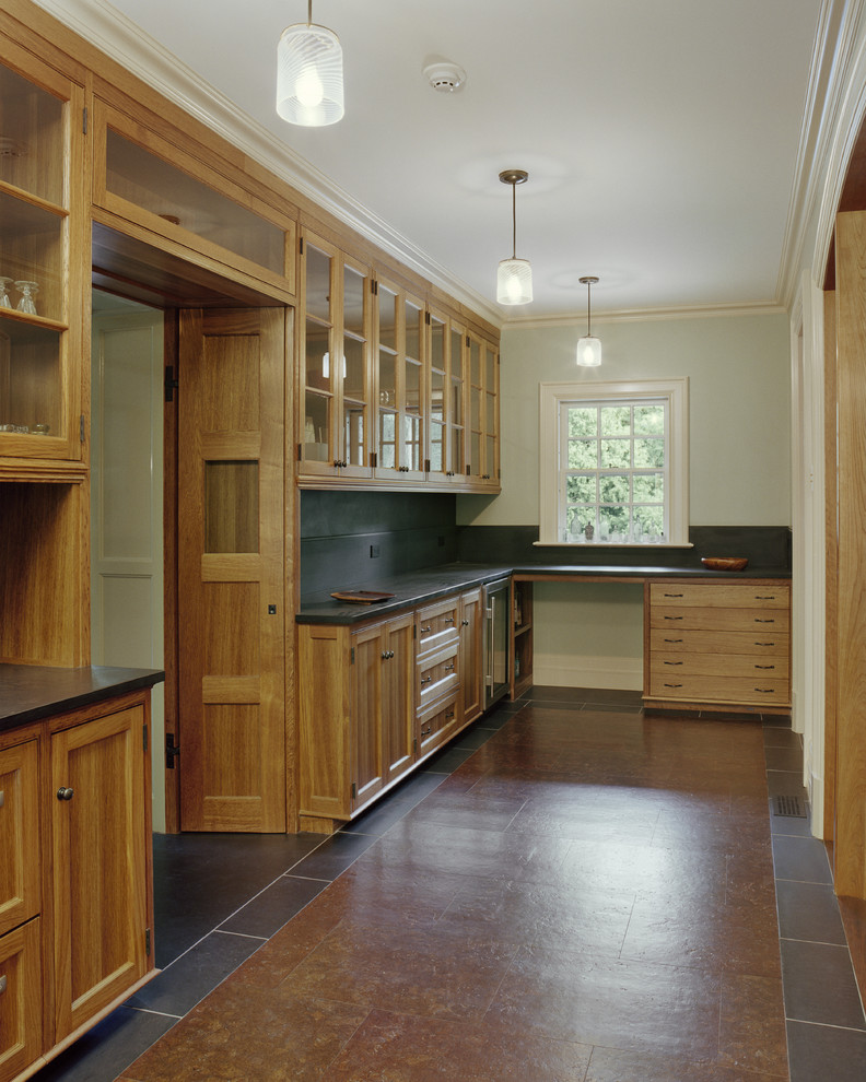 Design ideas for a traditional separate kitchen in New York with shaker cabinets and medium wood cabinets.