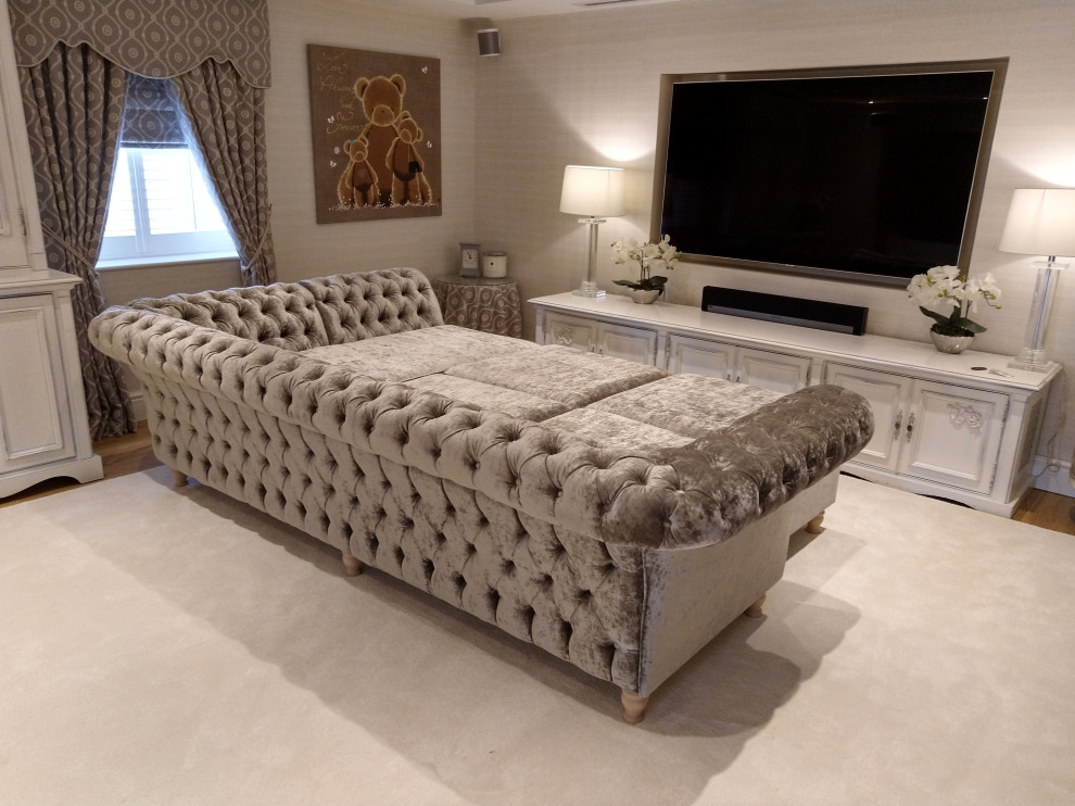 Design ideas for a large contemporary enclosed living room in Hertfordshire with carpet, a wall-mounted tv, beige floor and coffered.