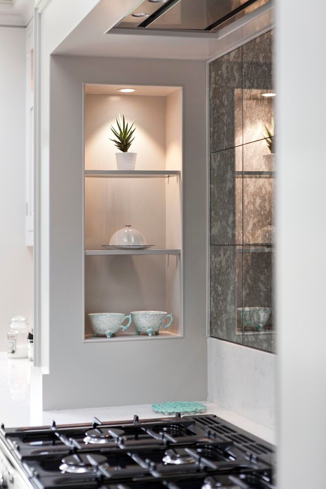 Example of a transitional kitchen design in Dublin