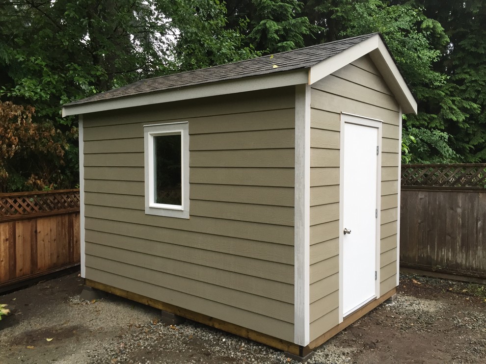 This is an example of a mid-sized traditional detached garden shed in Vancouver.