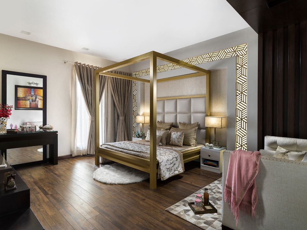 This is an example of a modern bedroom in Delhi with dark hardwood floors, brown floor and grey walls.