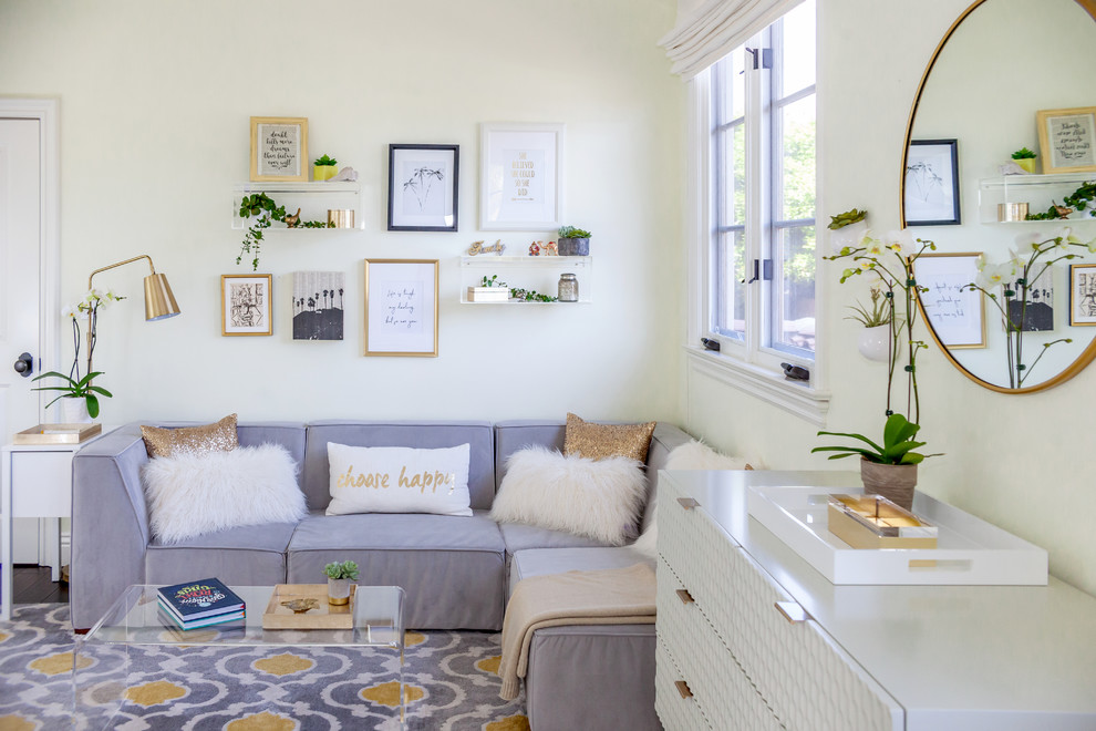 Large kids' room in Los Angeles with white walls, carpet and multi-coloured floor for girls.