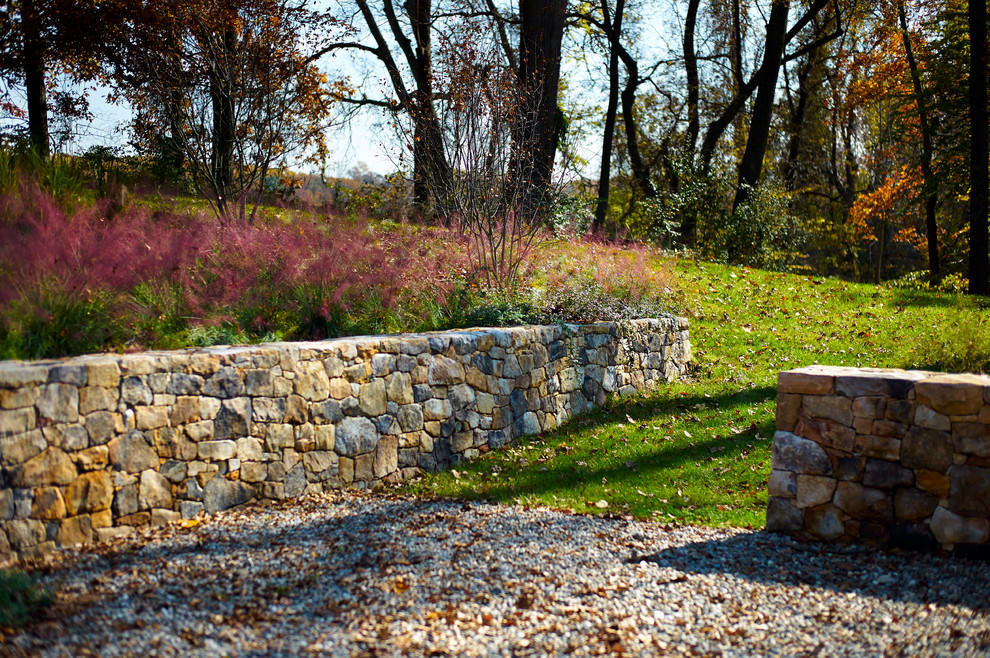 Design ideas for a country garden in Philadelphia with a retaining wall.