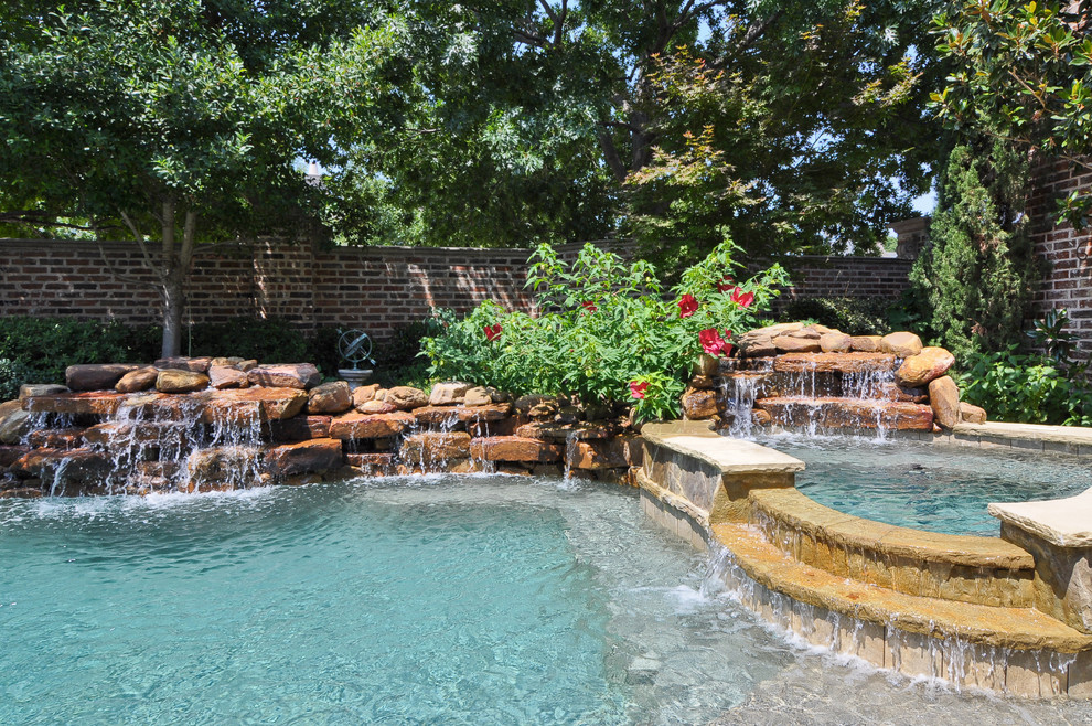 Photo of a traditional custom-shaped pool in Dallas.