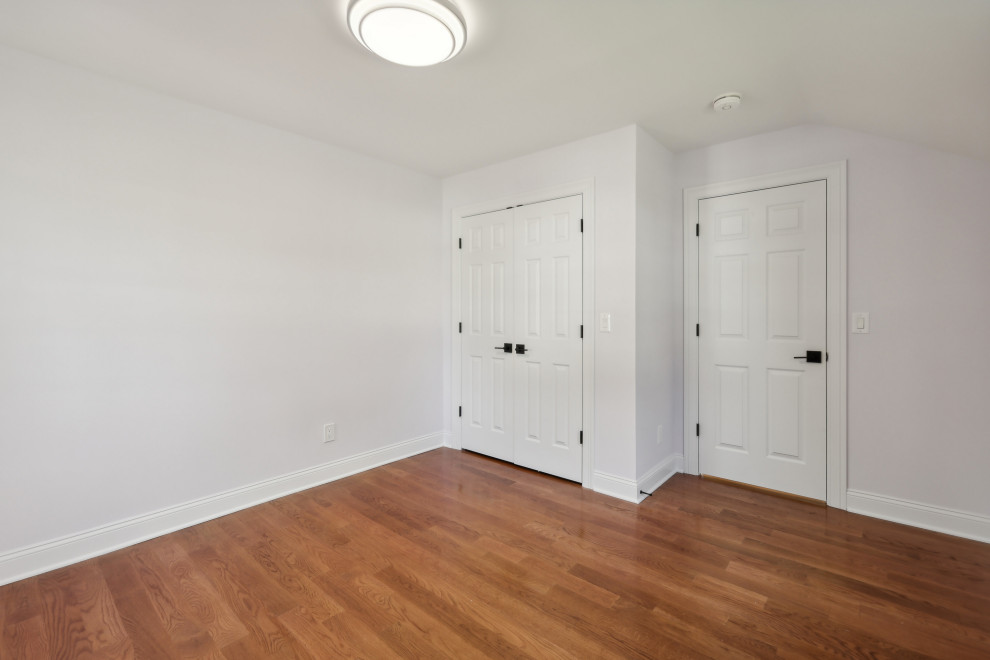 Bedroom with Drum Light and Six-Panel Doors