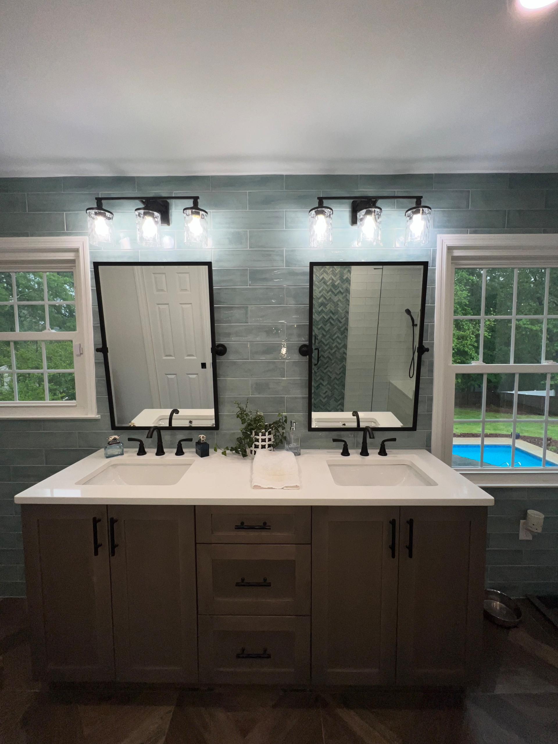 Walk in shower with custom stained vanity