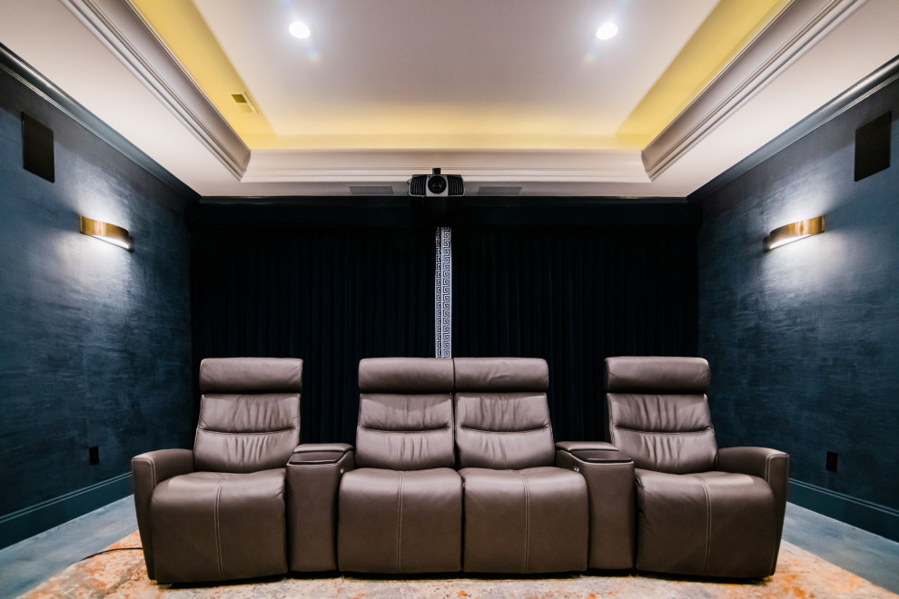 Mid-sized transitional enclosed home theatre in Charlotte with blue walls, concrete floors, a projector screen and blue floor.