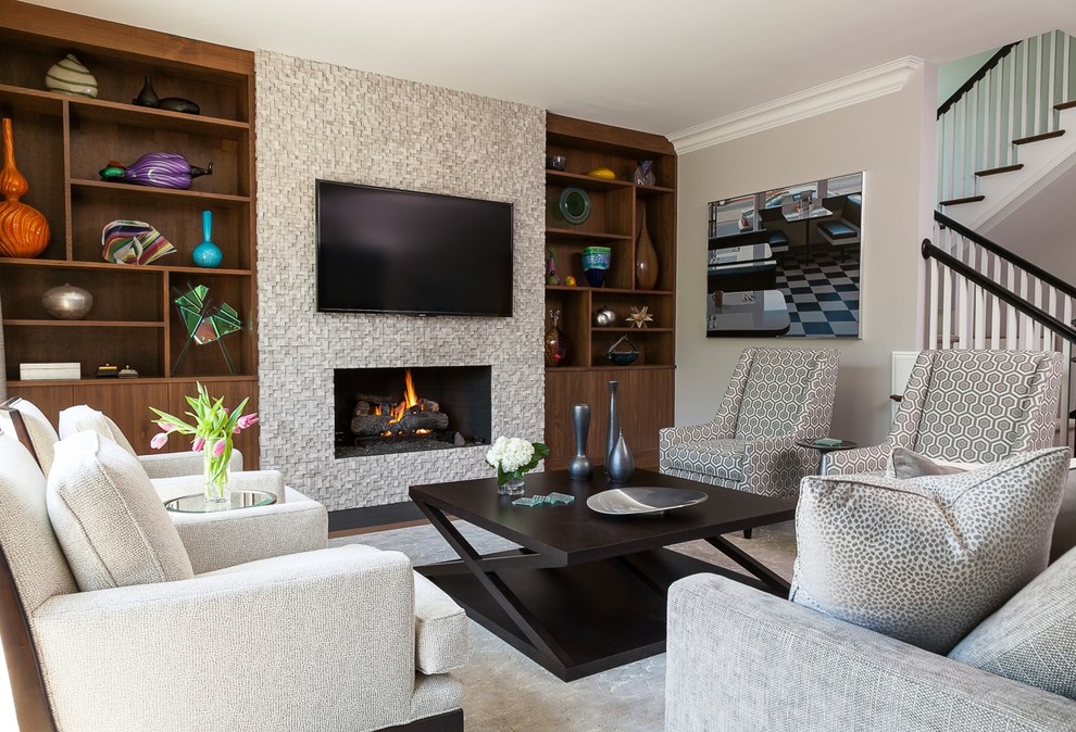 This is an example of an expansive contemporary open concept family room in DC Metro with grey walls, medium hardwood floors, a standard fireplace, a stone fireplace surround and a wall-mounted tv.