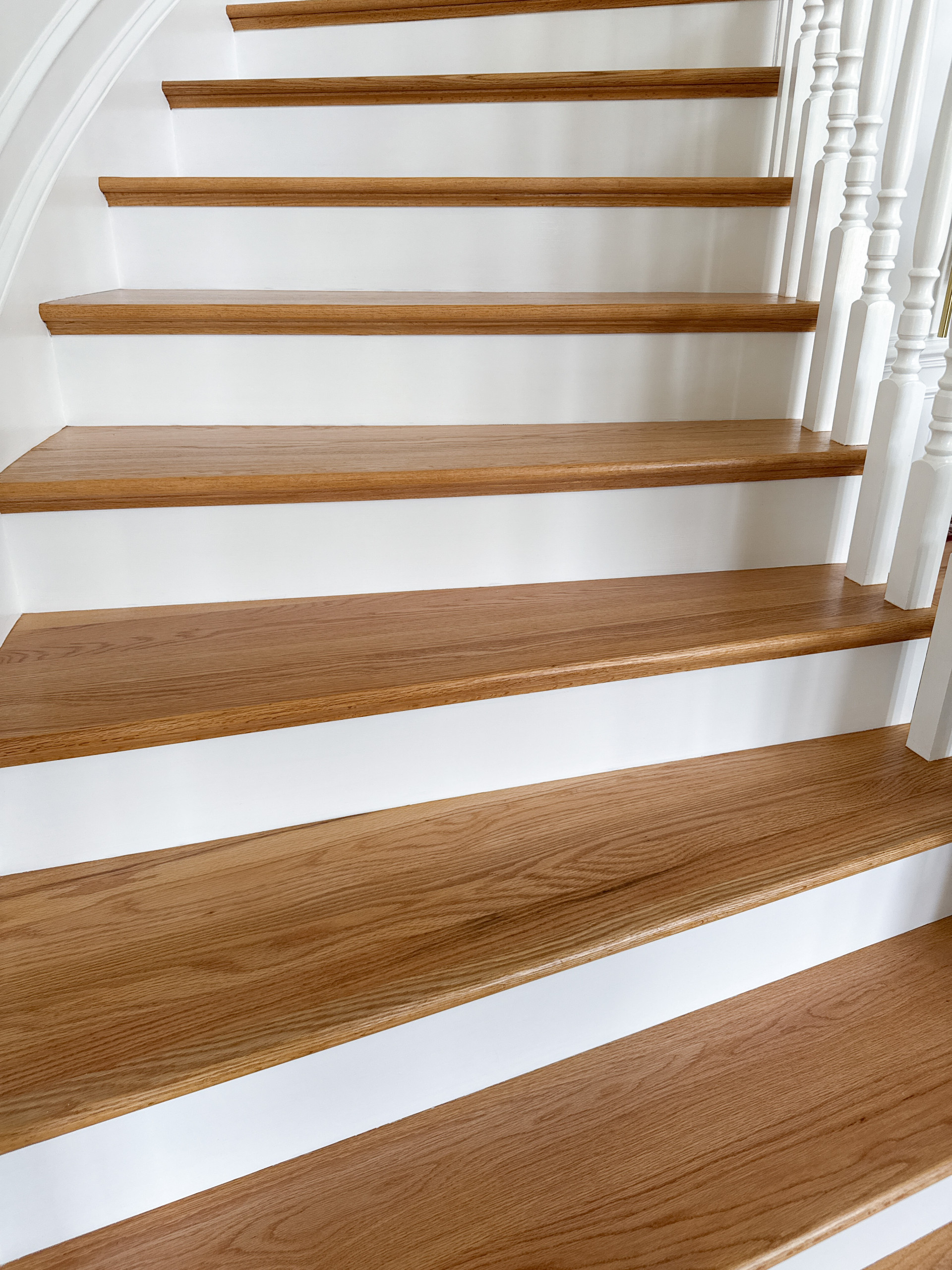 Project #161 | Curved Red Oak Foyer Staircase, 26 Years Later