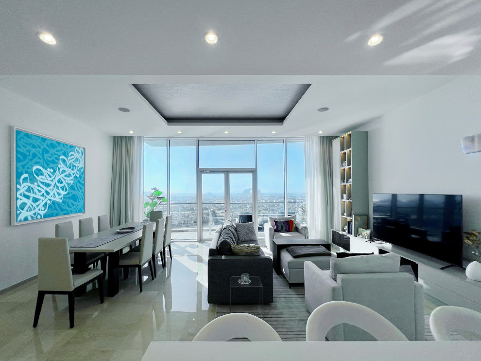 Esempio di un soggiorno minimalista di medie dimensioni e aperto con pareti bianche, pavimento in marmo, parete attrezzata, pavimento beige, soffitto ribassato e angolo bar
