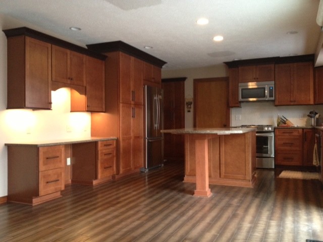Mid-sized transitional home design photo