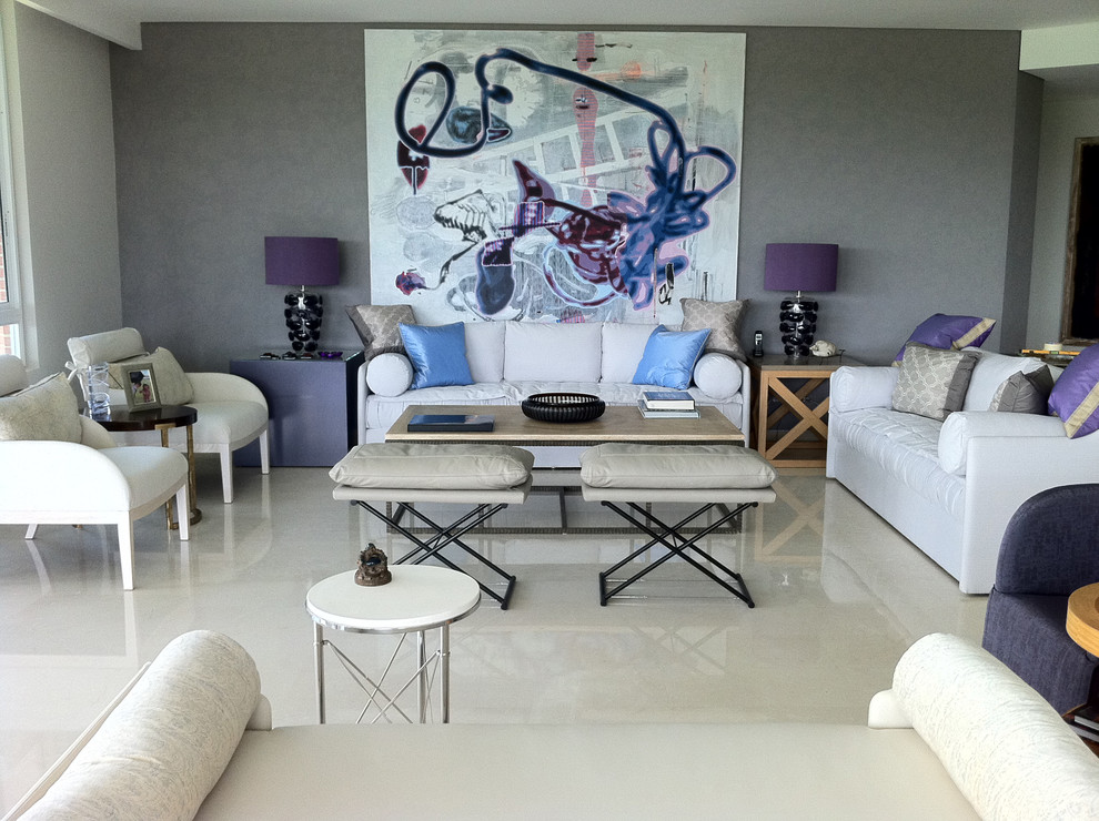 Inspiration for a transitional living room in Miami with grey walls.