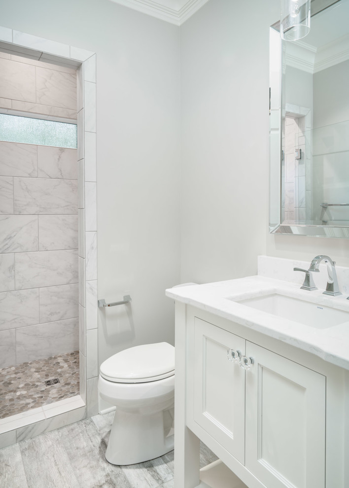 Inspiration for a mid-sized transitional 3/4 bathroom in Other with shaker cabinets, white cabinets, an alcove shower, a two-piece toilet, gray tile, marble, grey walls, dark hardwood floors, an undermount sink, marble benchtops, grey floor and an open shower.