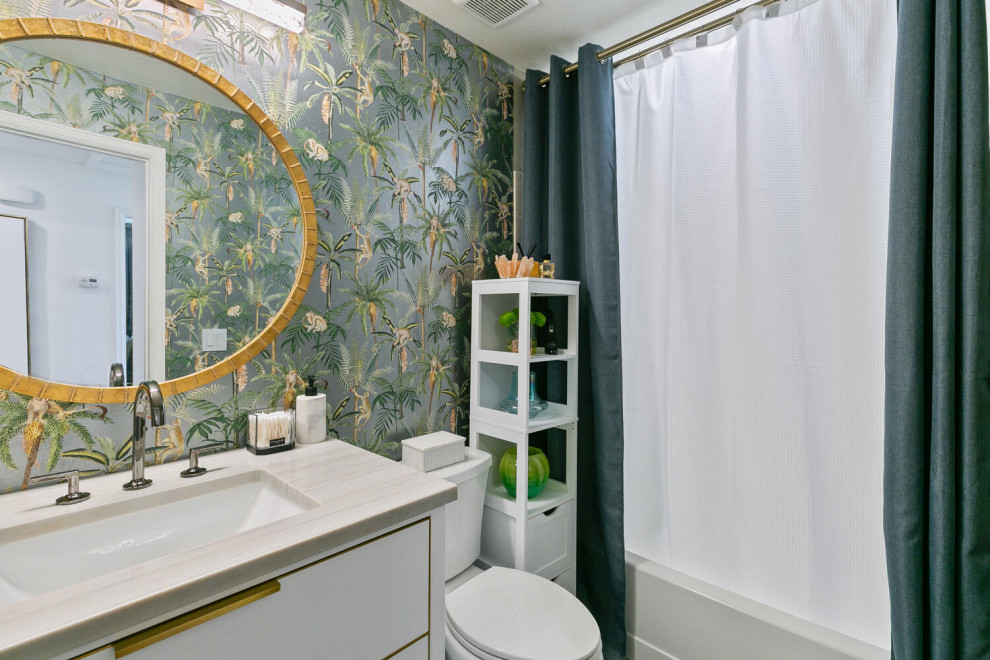 Small transitional kids' white tile and ceramic tile limestone floor, black floor, single-sink and wallpaper alcove bathtub photo in Denver with flat-panel cabinets, white cabinets, green walls, an undermount sink, quartzite countertops, white countertops and a built-in vanity