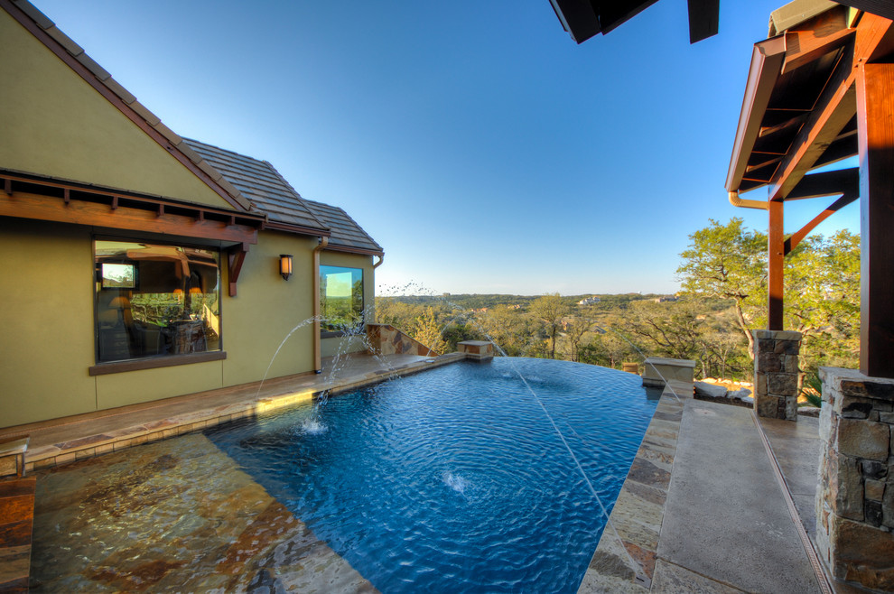 Inspiration for a rustic pool remodel in Austin