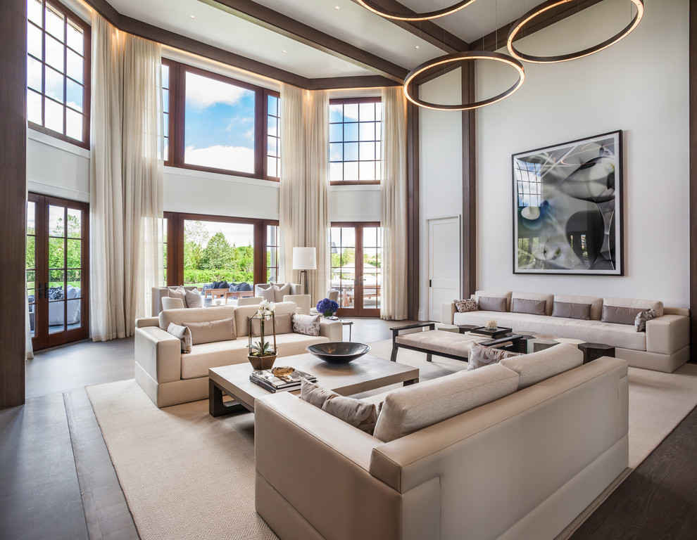 Inspiration for an expansive contemporary formal open concept living room in New York with dark hardwood floors, a standard fireplace and a stone fireplace surround.