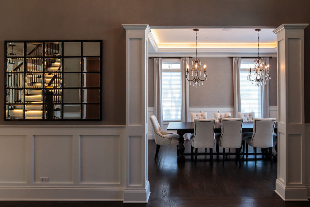 Inspiration for a mid-sized traditional separate dining room in Chicago with grey walls, dark hardwood floors and no fireplace.