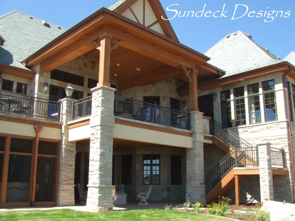 Large mountain style deck photo in Denver