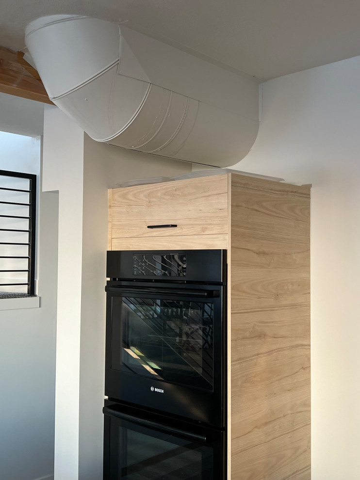 Need ideas on how to hide the uglyductling in my kitchen