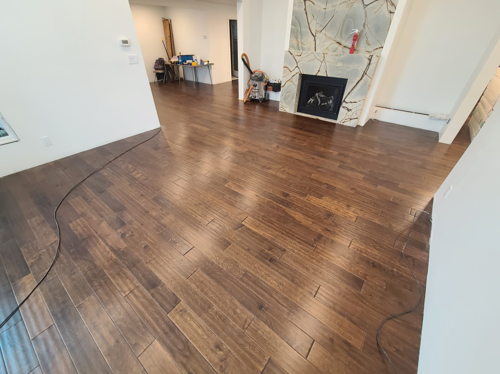 Sleek Engineered Hardwood & Modern Sliding Door by I’m The Man Services