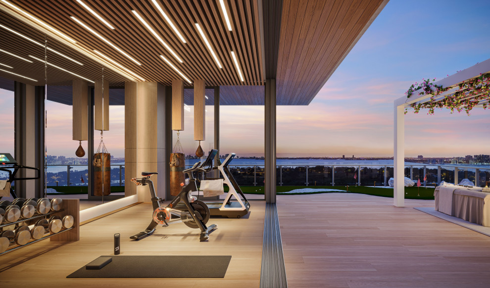 Photo of a modern home gym in Miami.