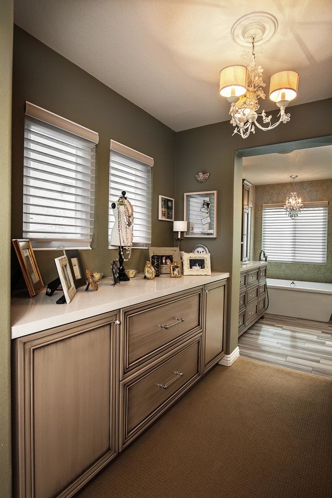 Example of a mid-sized transitional master white tile and stone tile porcelain tile freestanding bathtub design in Orange County with an undermount sink, furniture-like cabinets, beige cabinets, quartz countertops, a two-piece toilet and beige walls
