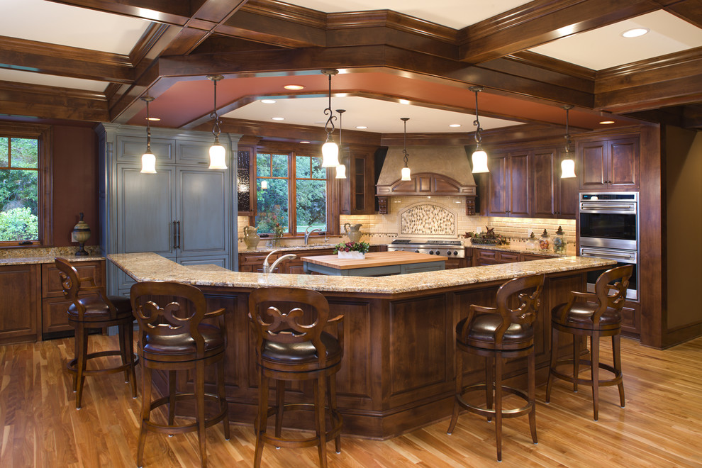 This is an example of a beach style kitchen in Minneapolis with panelled appliances.