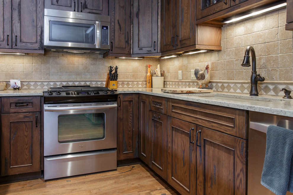 Mountain style kitchen photo in Denver