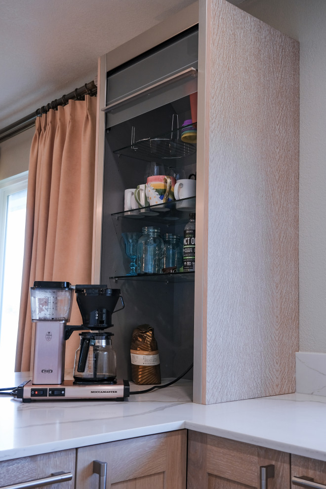Small transitional u-shaped ceramic tile and beige floor open concept kitchen photo in San Francisco with a double-bowl sink, recessed-panel cabinets, light wood cabinets, quartz countertops, white backsplash, quartz backsplash, stainless steel appliances and white countertops