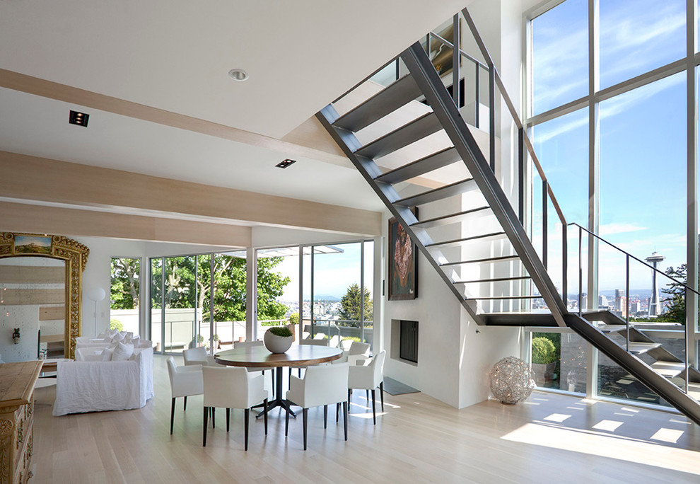 This is an example of a contemporary l-shaped staircase in Seattle with open risers.