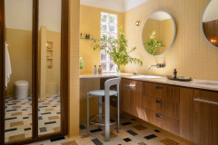 Plain Primary Bathroom Transformed Into a Warm Retreat