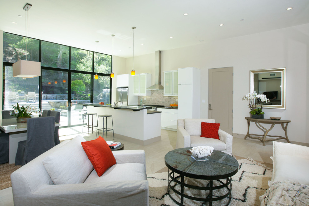 This is an example of a small contemporary open concept living room in San Francisco with white walls and porcelain floors.