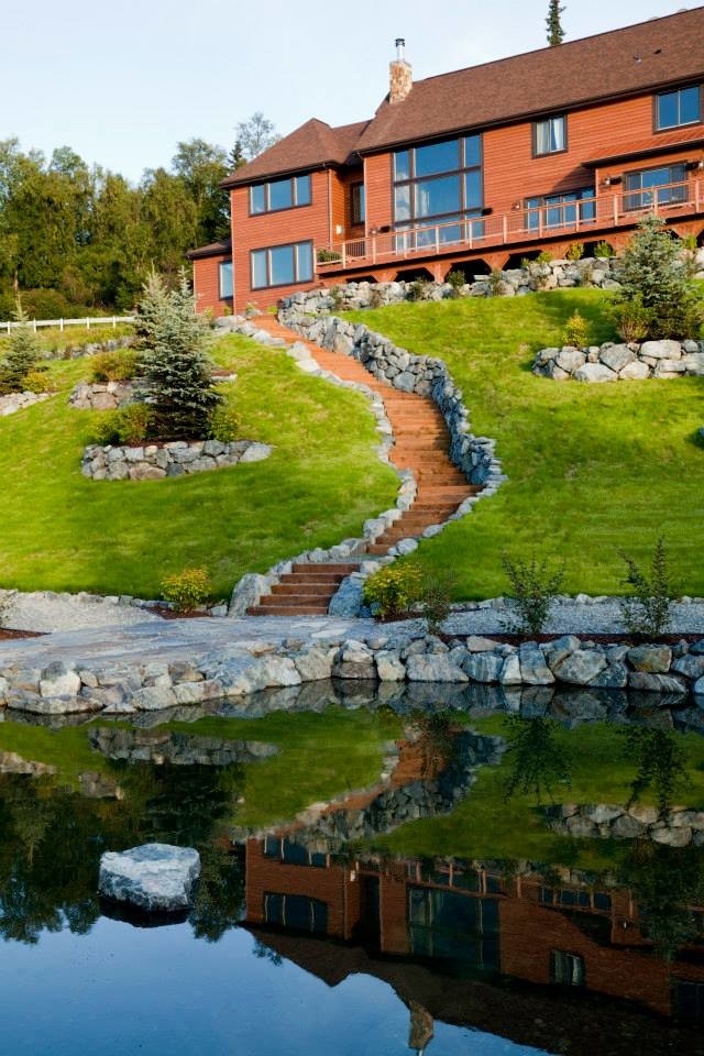 Design ideas for a large transitional full sun backyard pond.